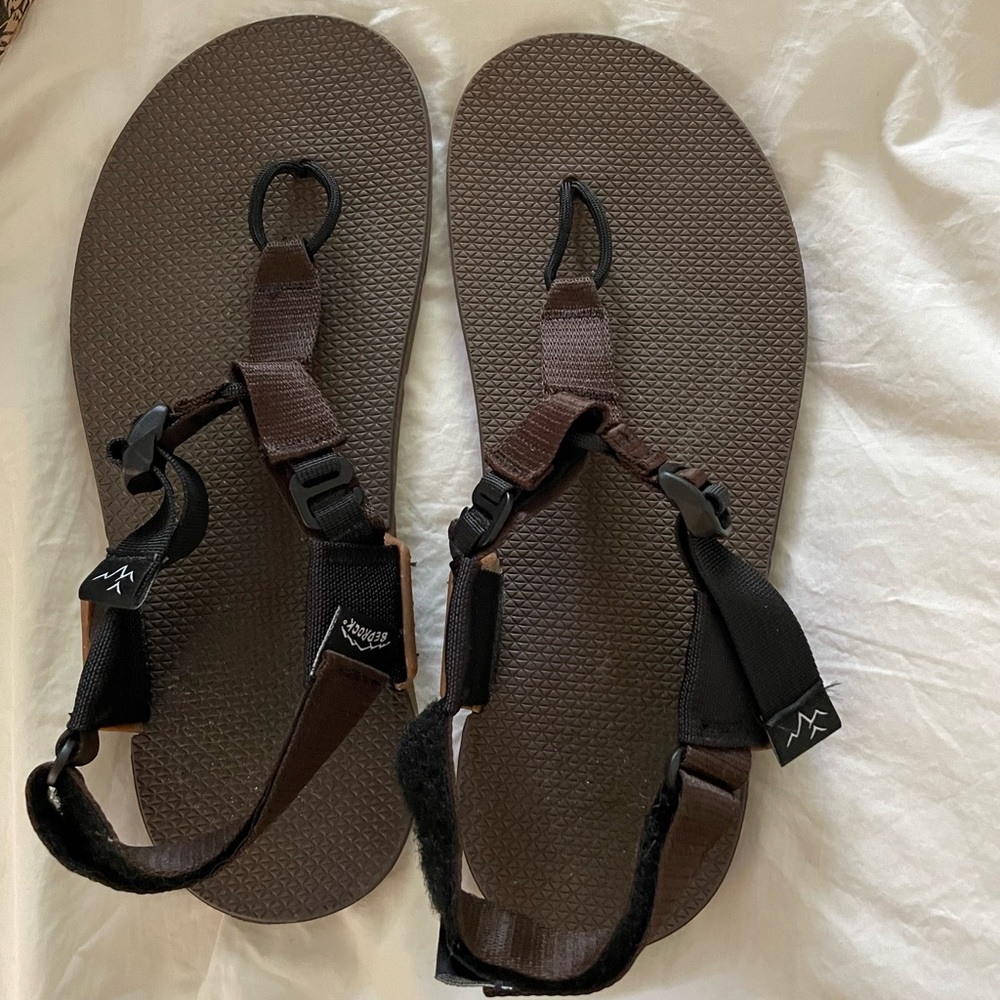 Brand new bedrock sandals. Size 9 mens size 10 women’s.